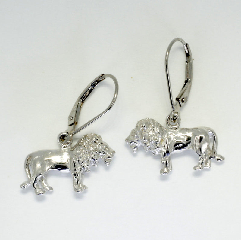 A pair of silver lion earrings.
