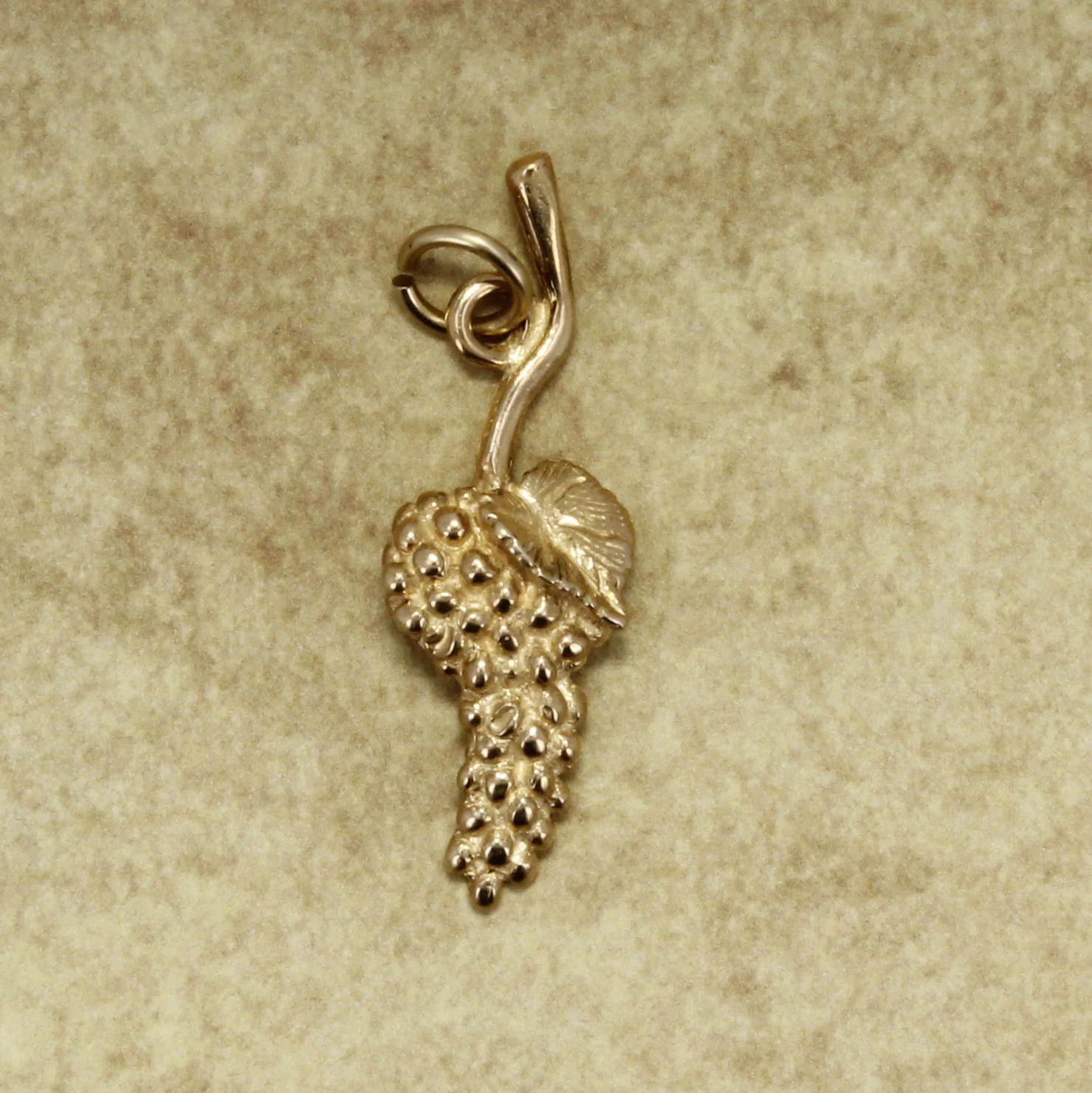 What material is the charm made of?