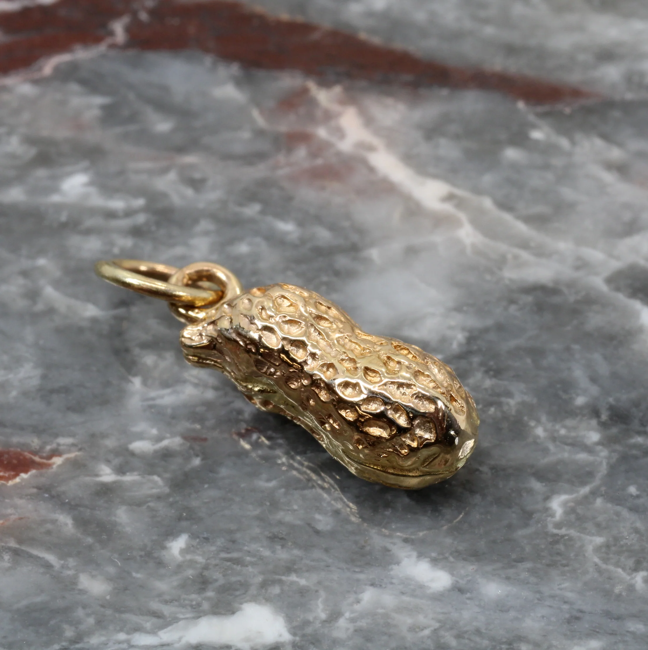 What is the material of the charm?