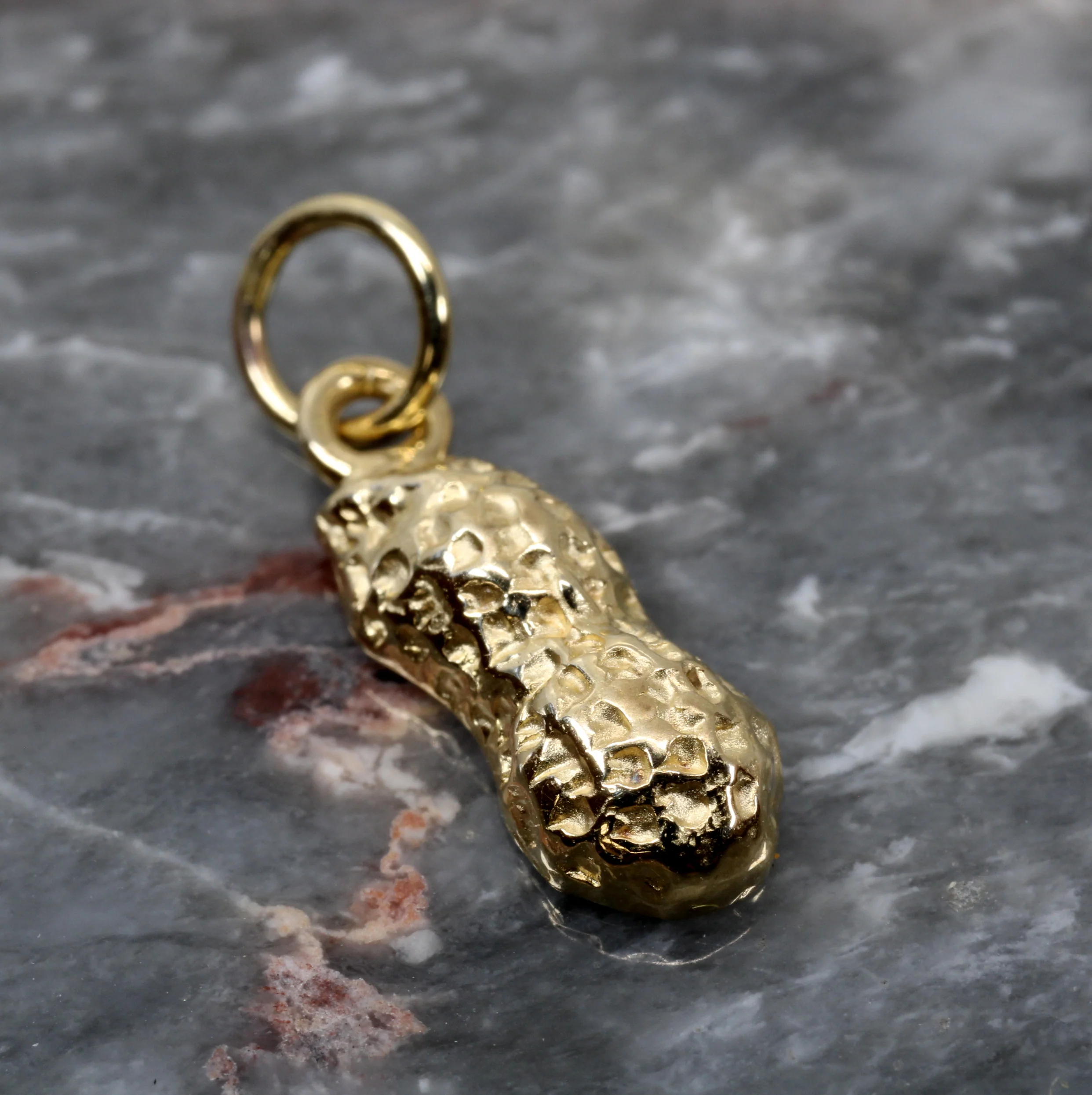 What is the thickness of the charm?
