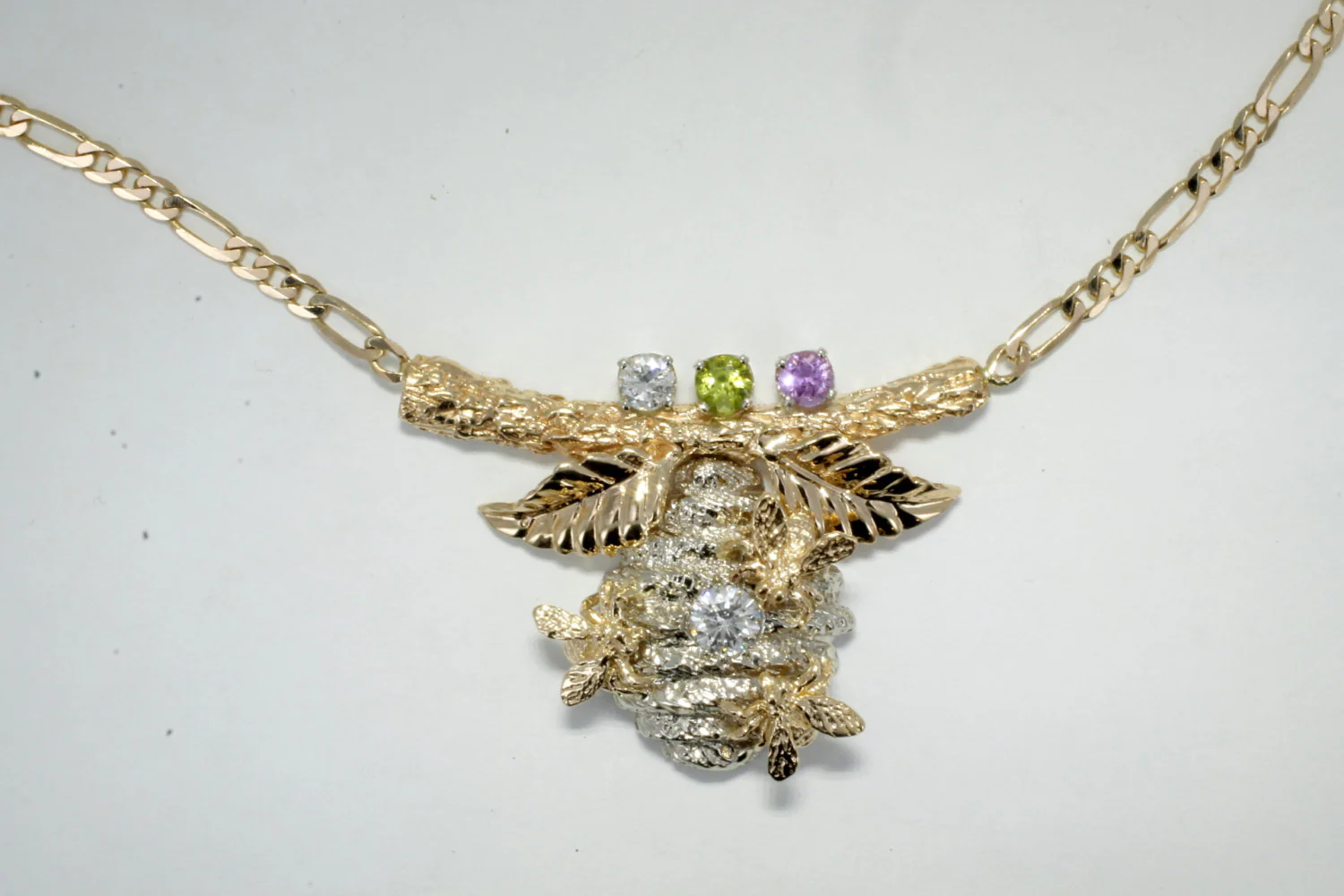 What type of diamond is included in the bee hive necklace?