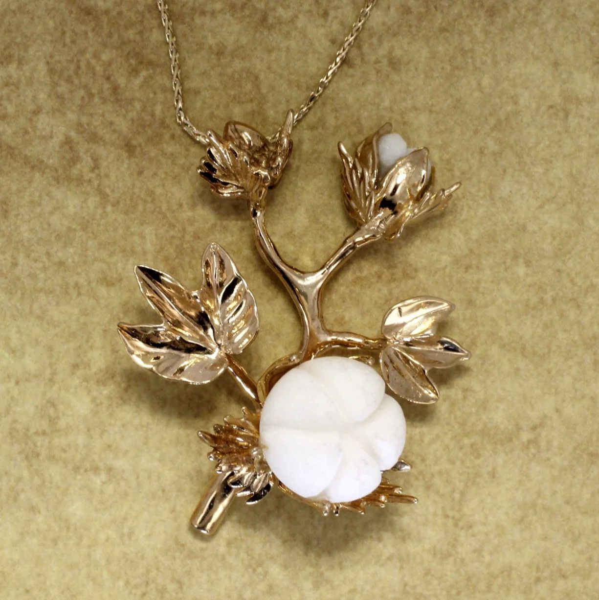 Cotton Boll Stages Necklace in 14kt Yellow Gold with White Stone Questions & Answers