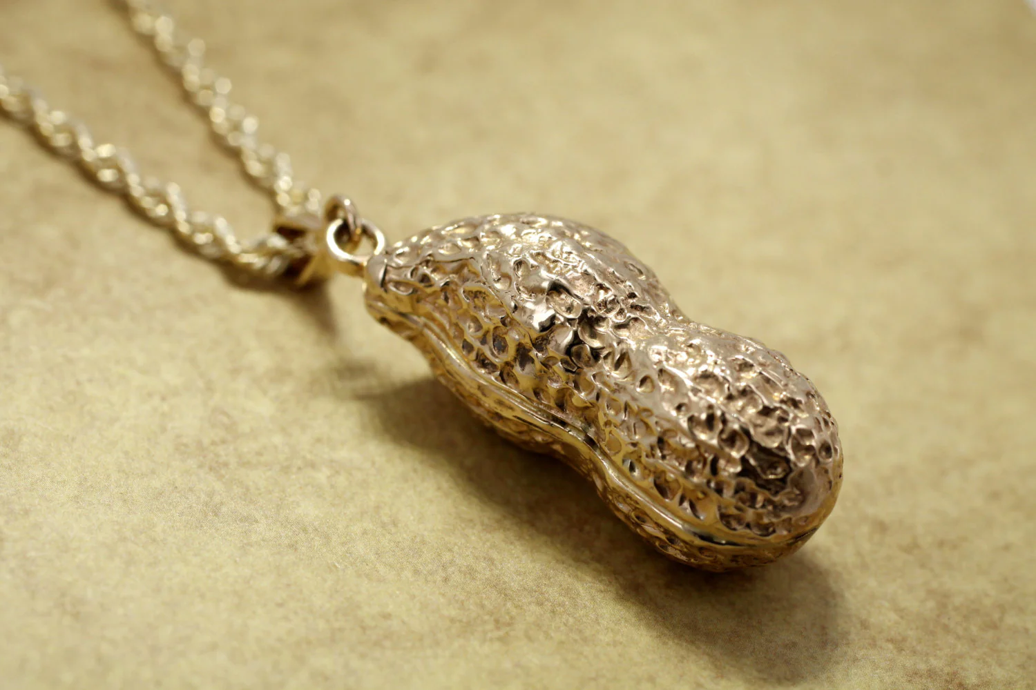 What does a gold necklace symbolize?