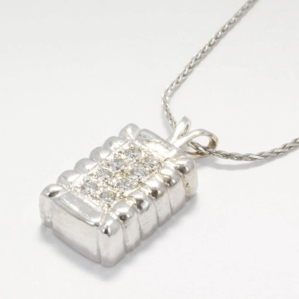 How can you tell if a 14K white gold chain is real?
