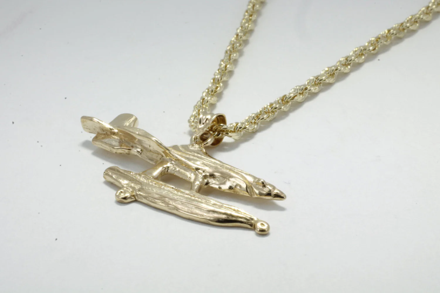 Mans Fire Boss Fire Fighting Plane Necklace in 14kt gold on rope chain Questions & Answers