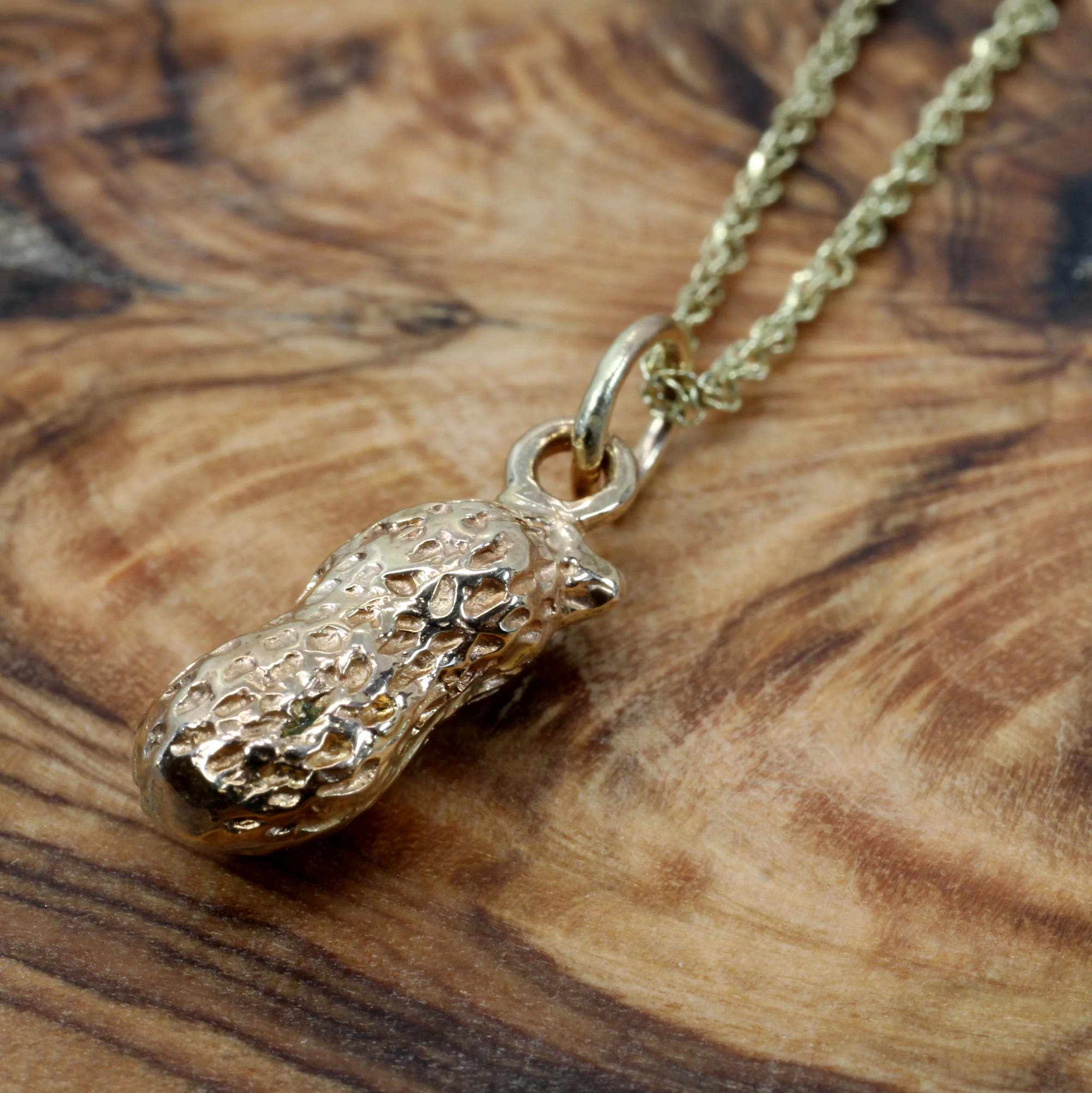 What is the meaning of the peanut charm?