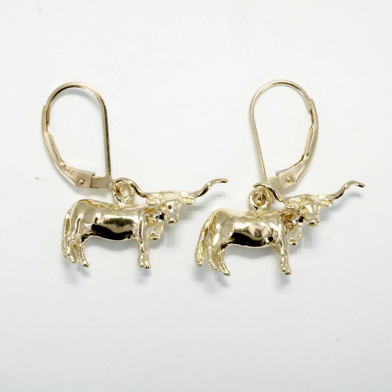 What is unique about the design of the earrings?