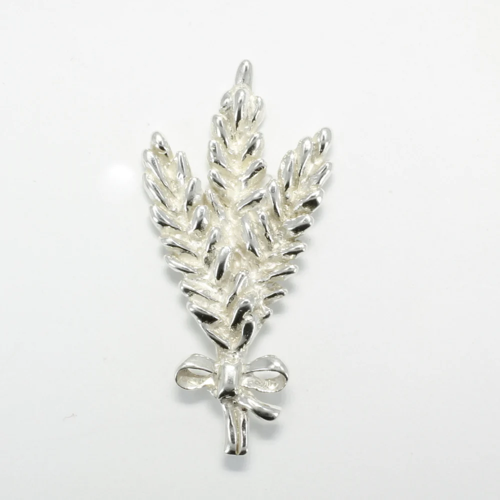 How tall is the tie tack/lapel pin?