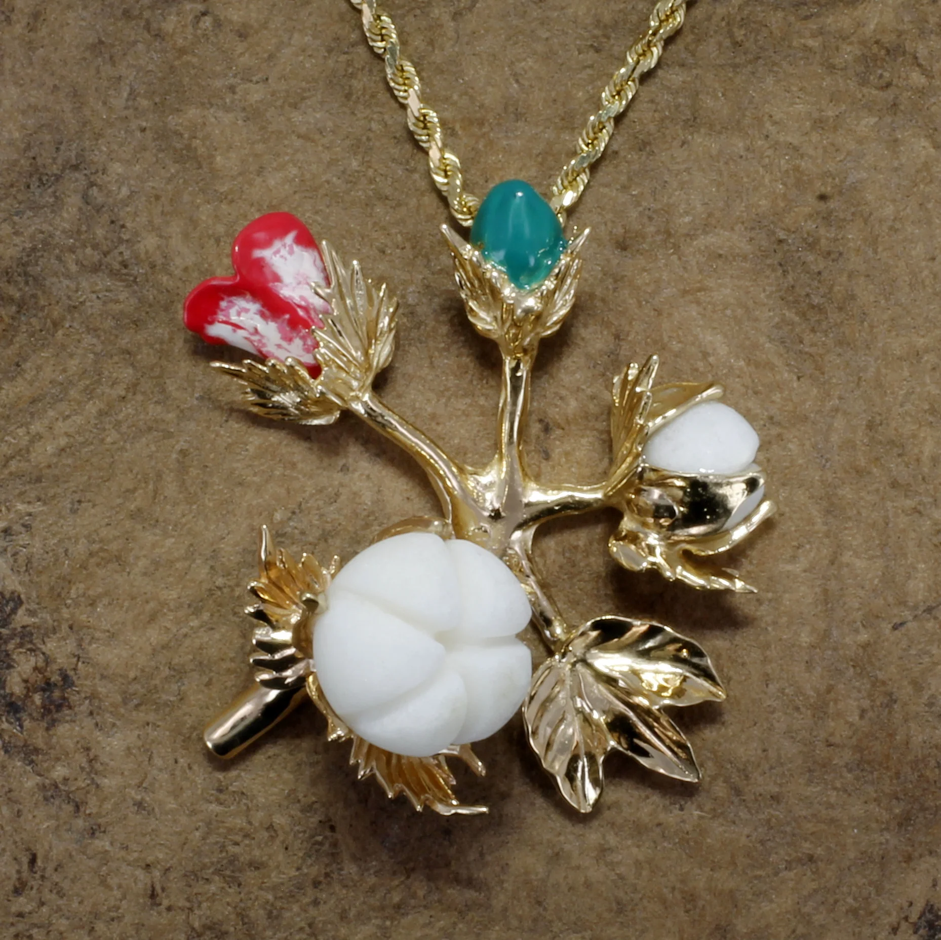 What is the material of the chain included with the necklace?