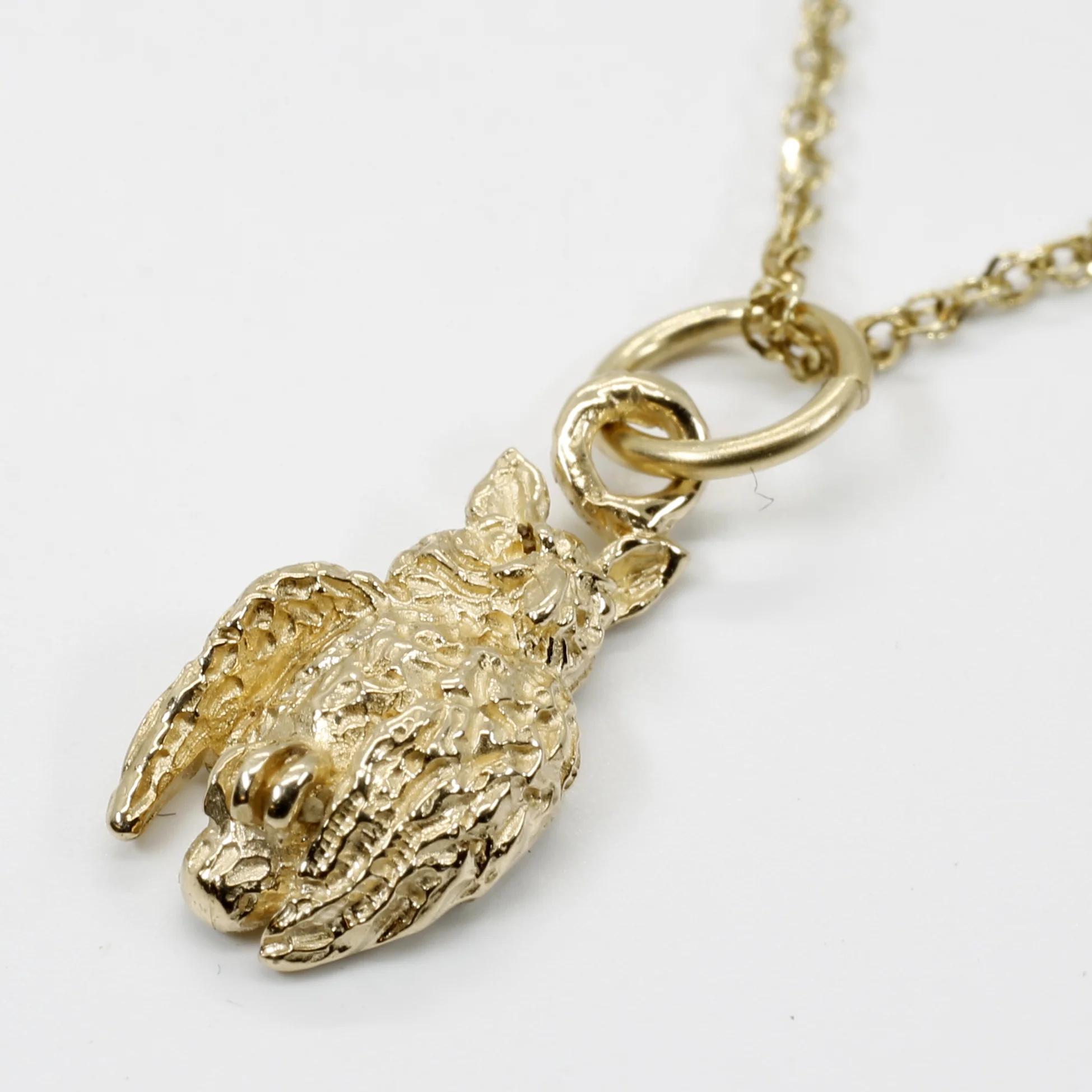 Gold Owl Necklace with tiny solid 14kt yellow gold owl looking to the side Questions & Answers