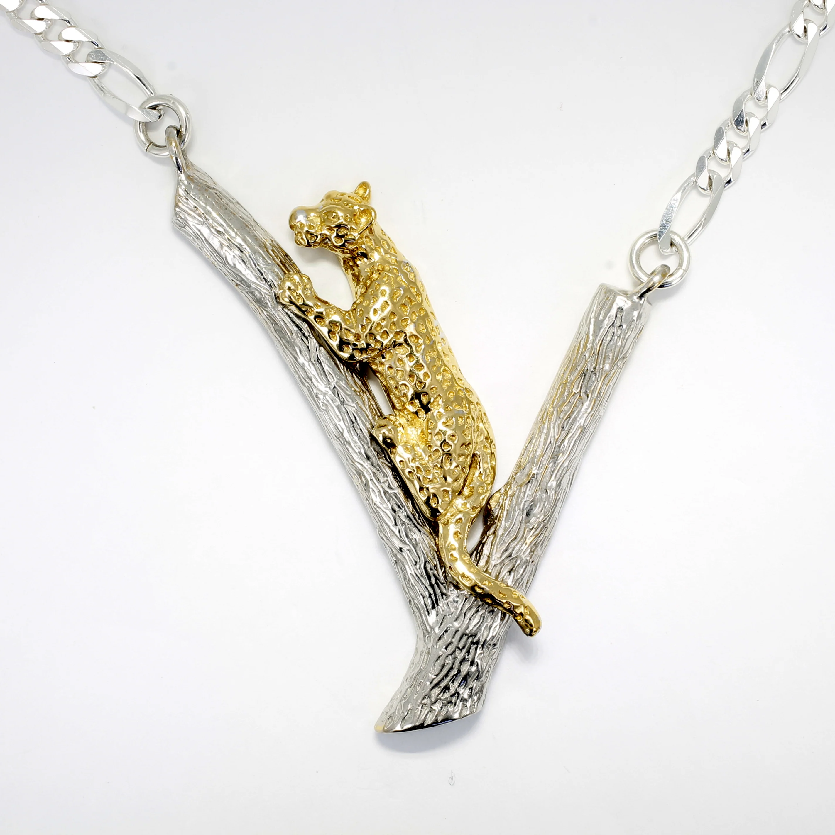 Large Gold Leopard on Silver Tree Branch with large silver link chain Questions & Answers