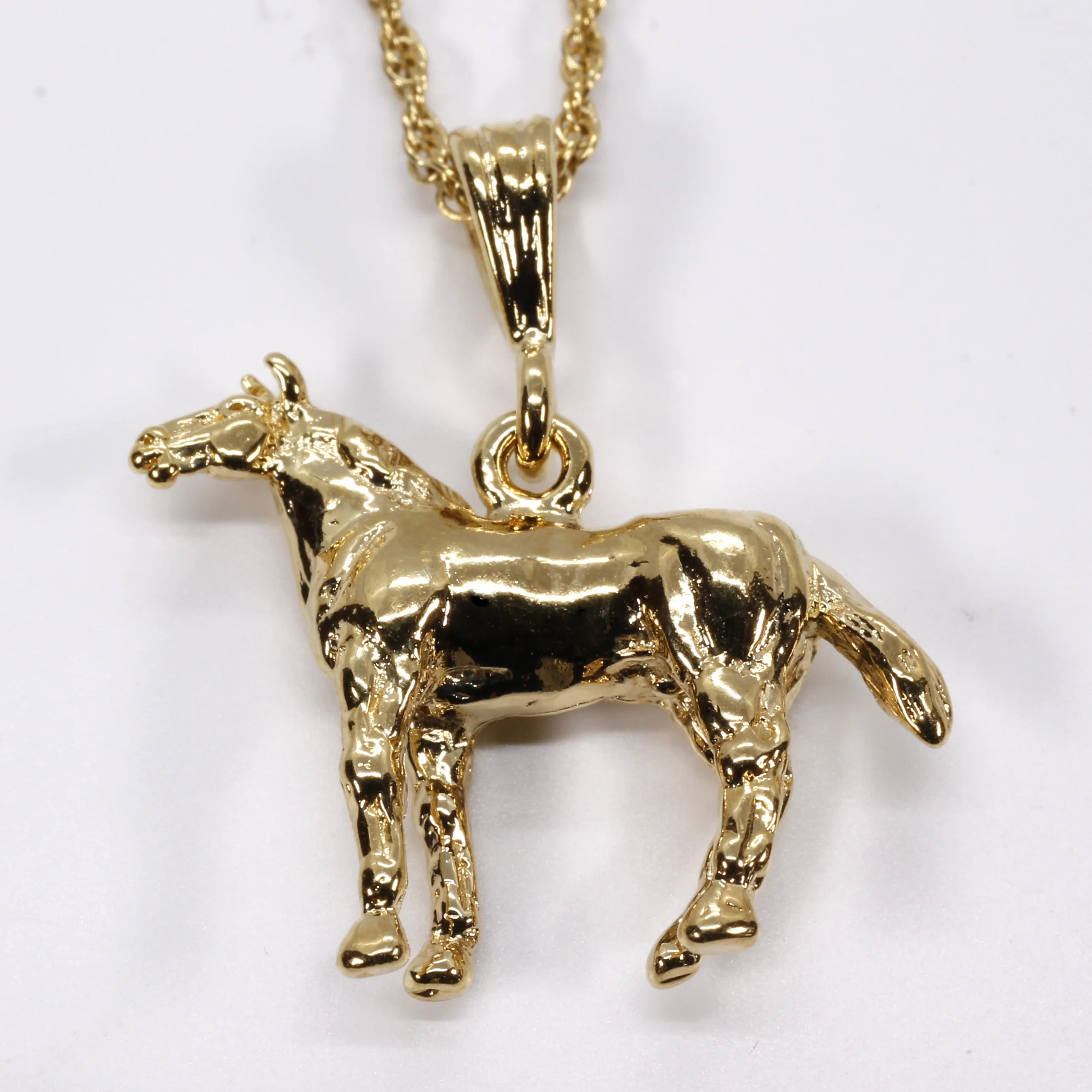How can you tell if a gold chain necklace is real gold?