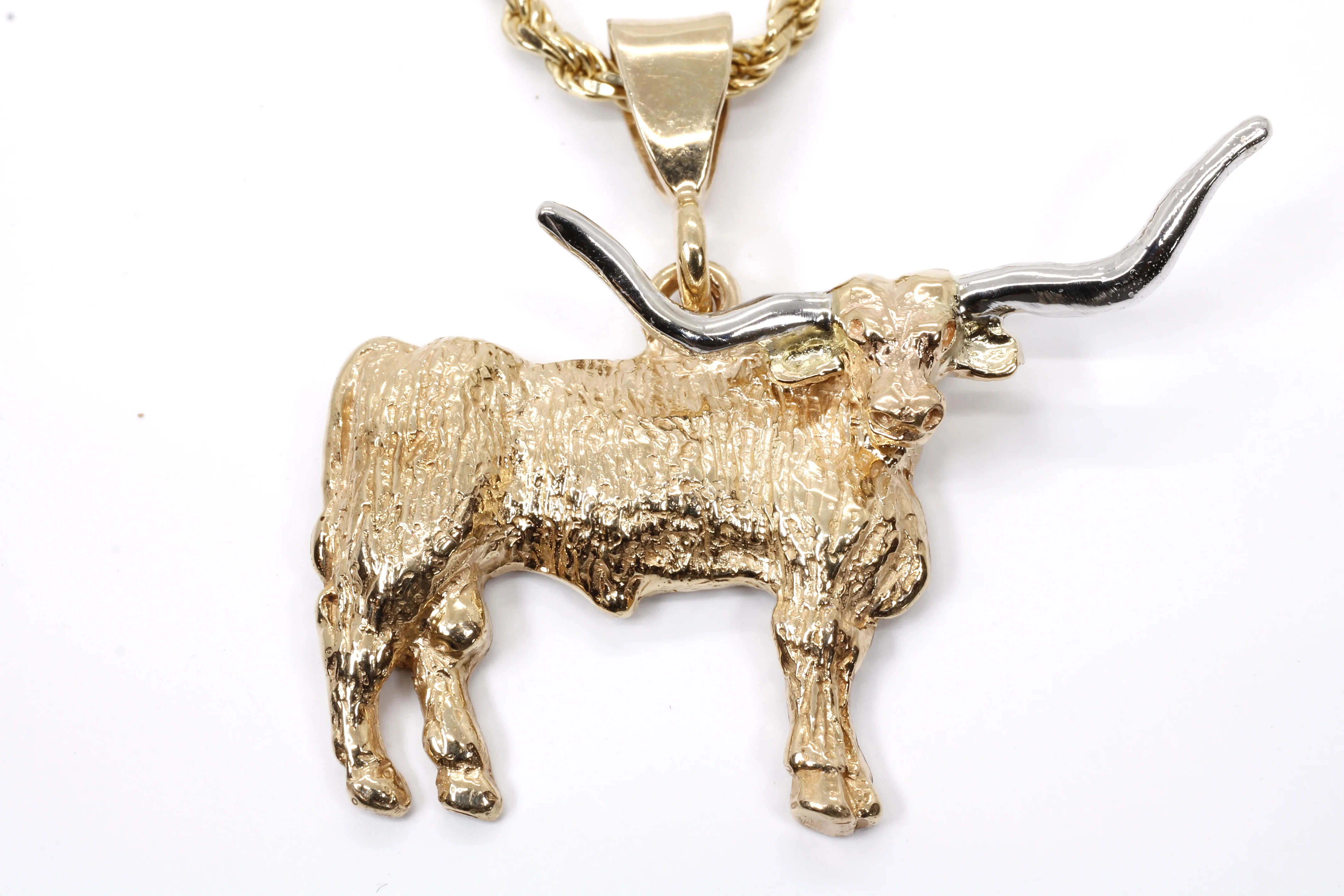 Giant Longhorn Necklace with Detailed Texas Longhorn made in solid 14kt gold Questions & Answers