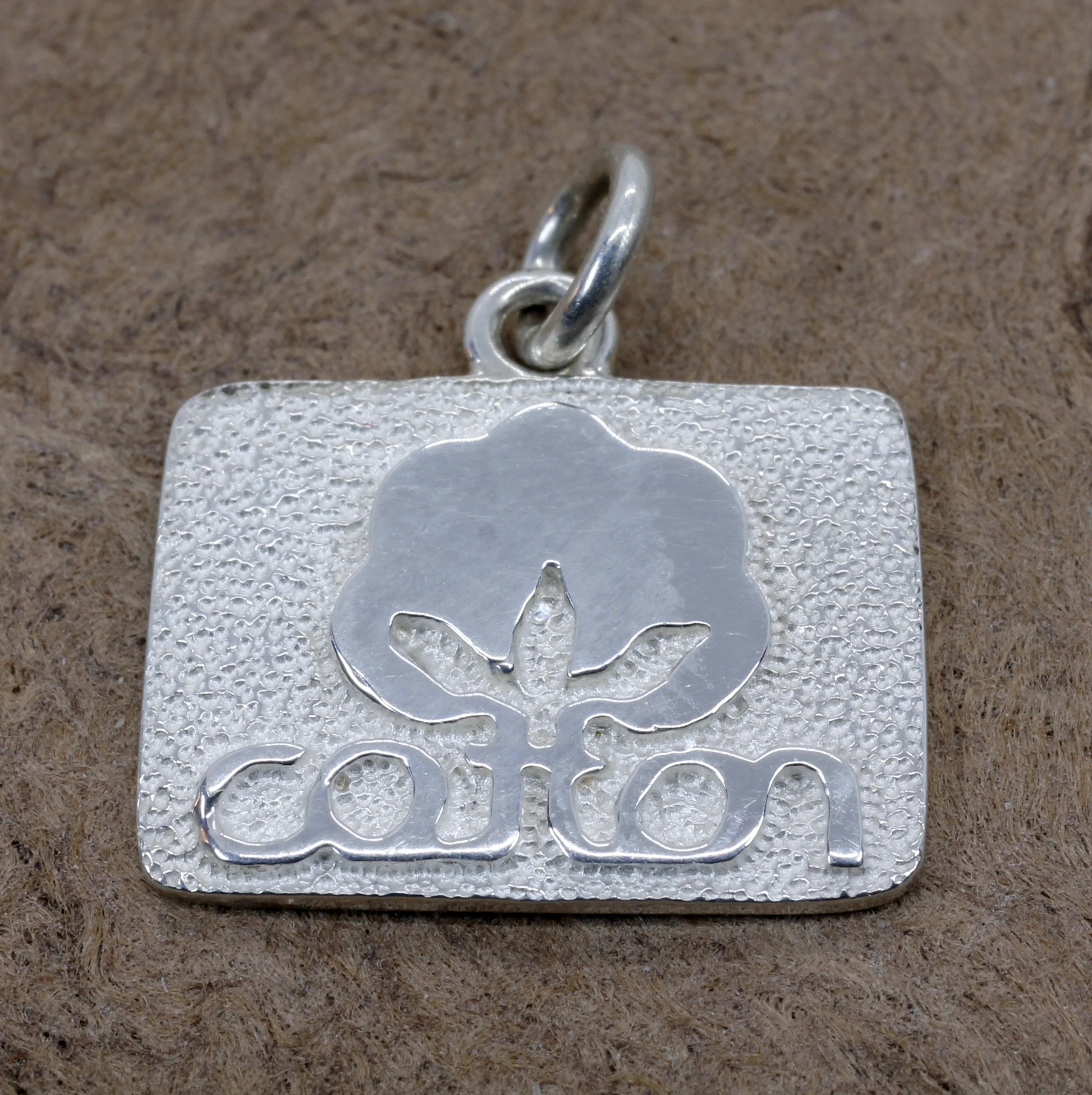 Cotton Inc Charm with Seal of Cotton Logo in 925 Sterling Silver Questions & Answers
