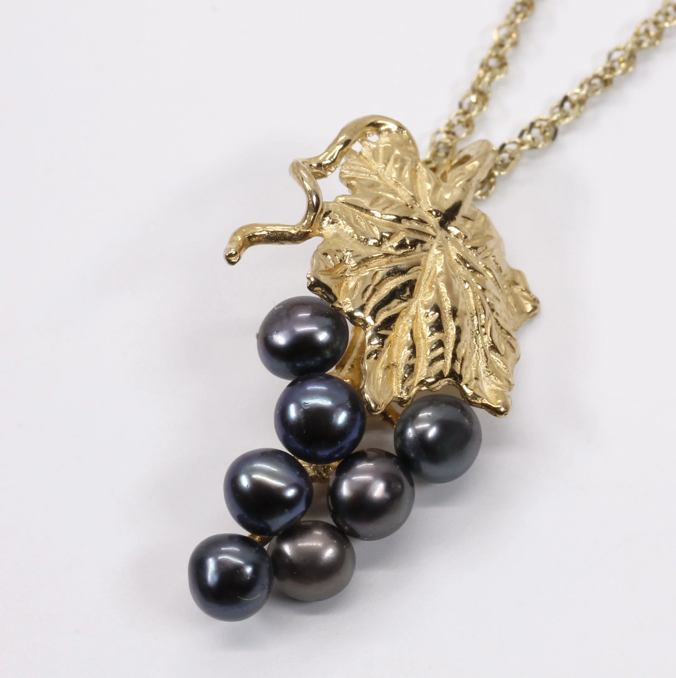 Tiny Size Grape Cluster Necklace in 14kt gold with Black Pearls Questions & Answers