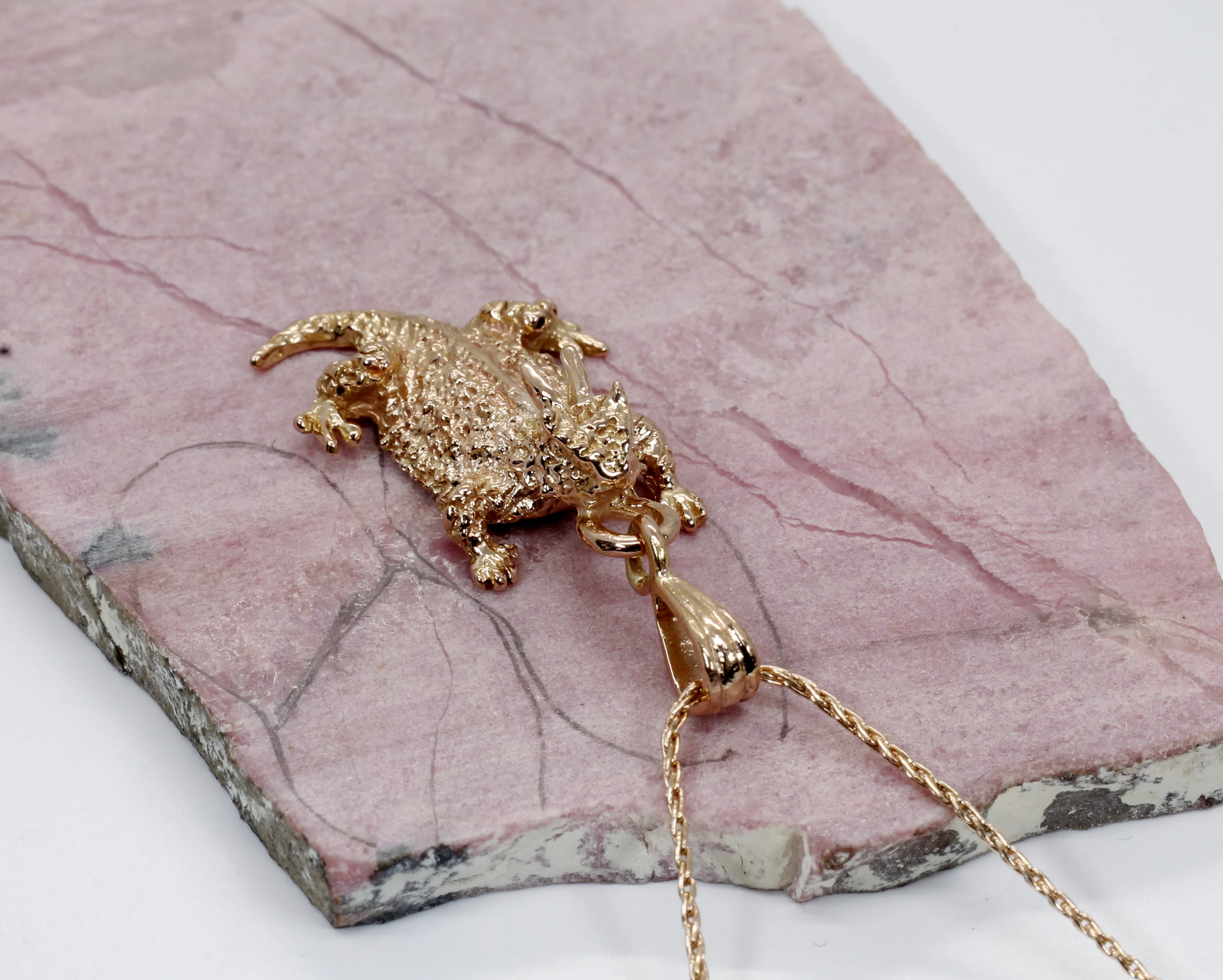 What's the delivery time for the rose gold toad necklace?