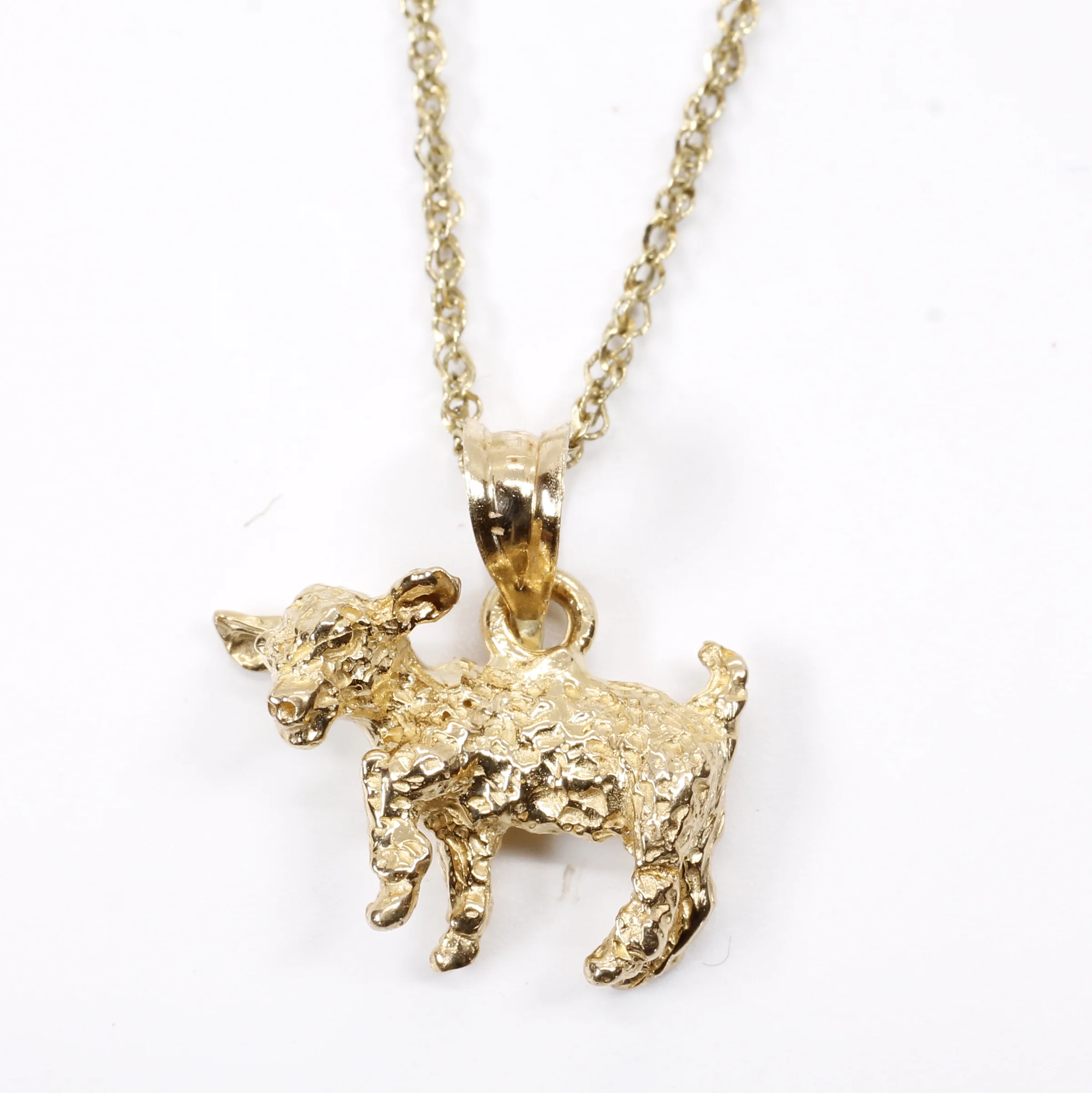 Gold Baby Goat Necklace with a 3-D Solid 14kt Gold Playful Goat Questions & Answers