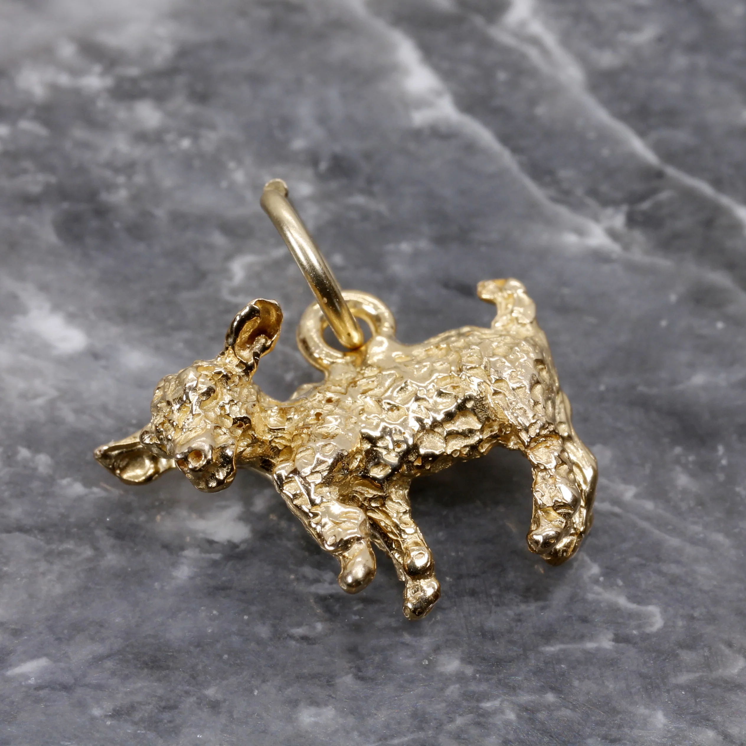 Is there a custom design service available for the baby goat charm?