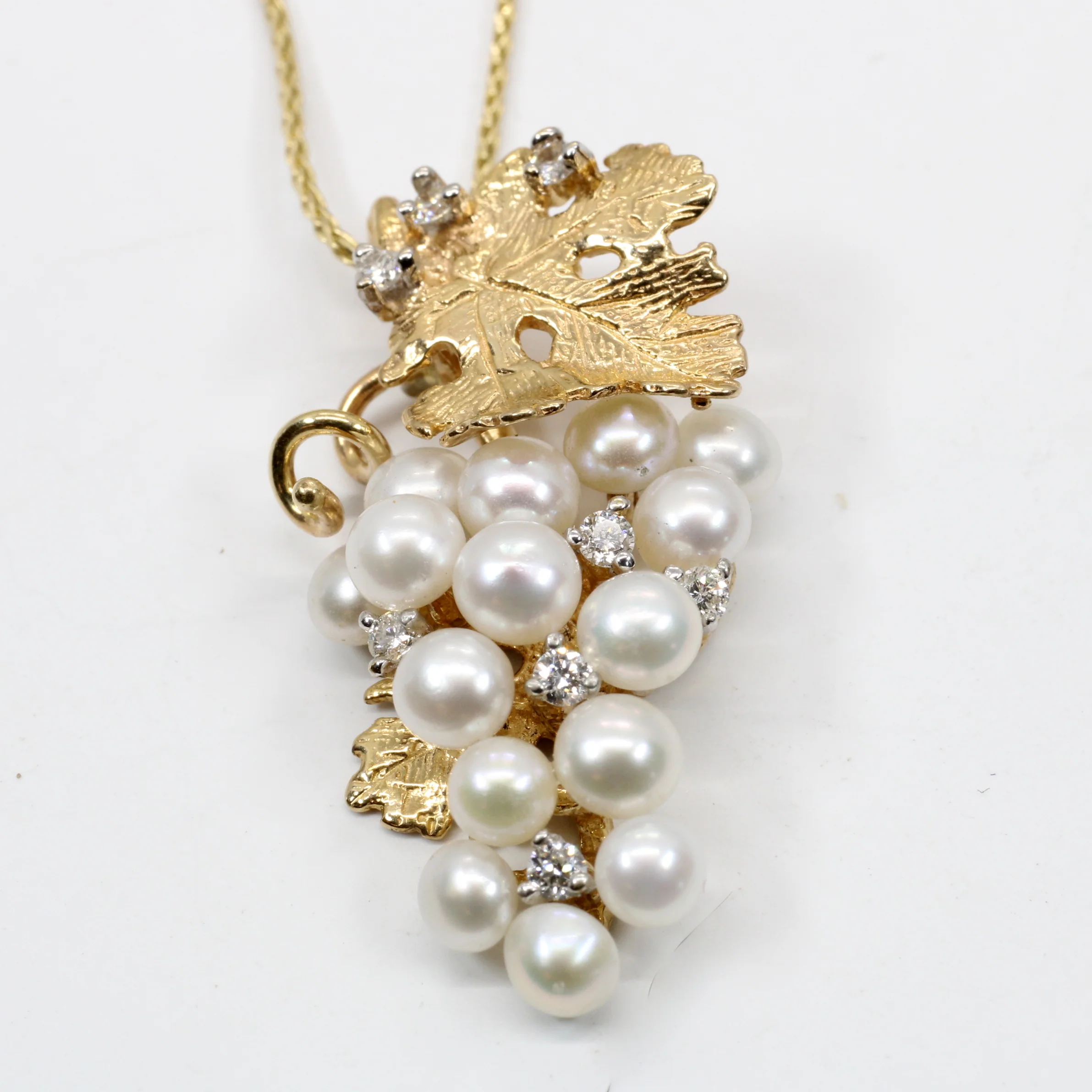 White Pearls Grape Cluster Necklace with diamonds made in 14kt Gold Questions & Answers