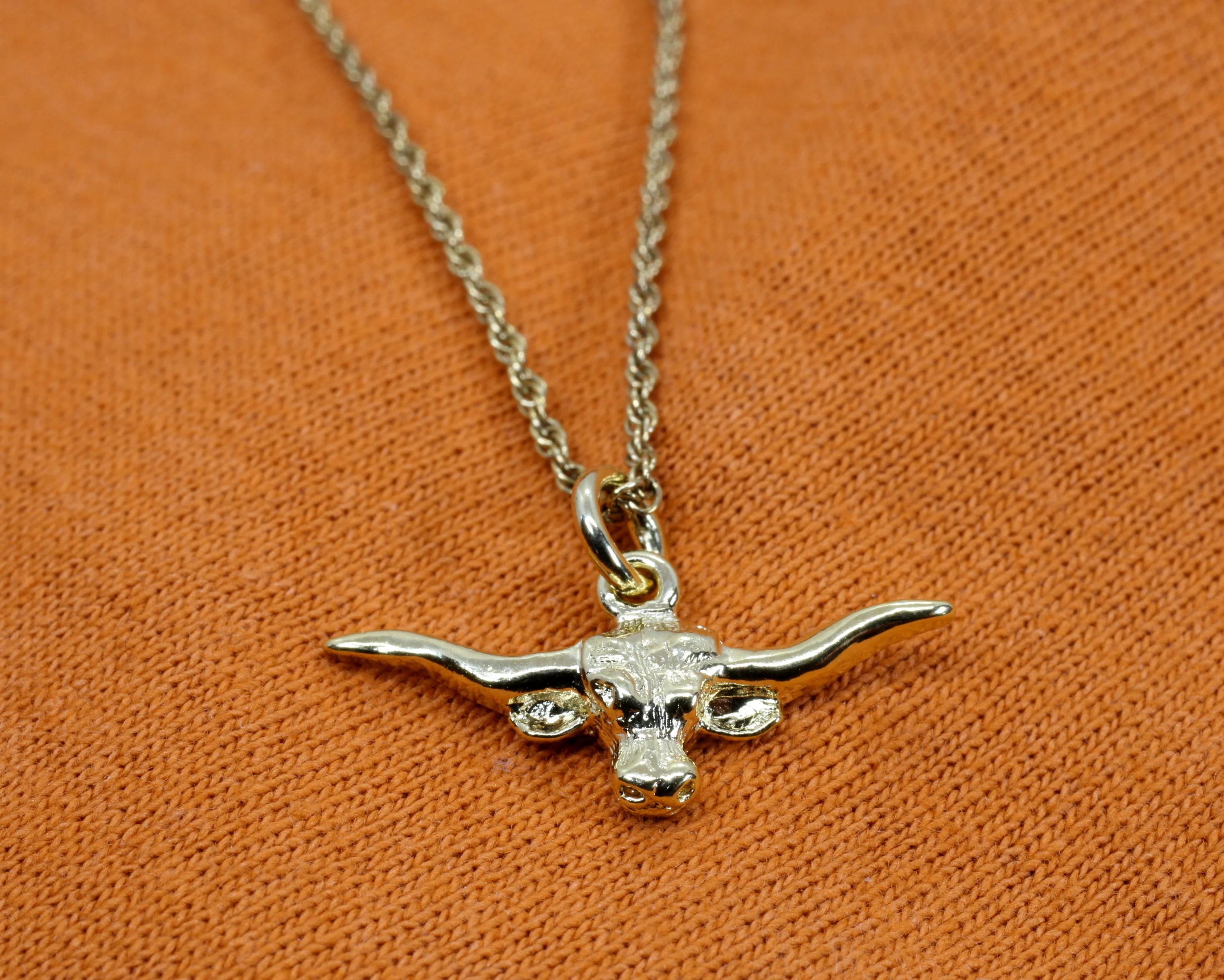 Is there a larger size available for the Longhorn necklace?