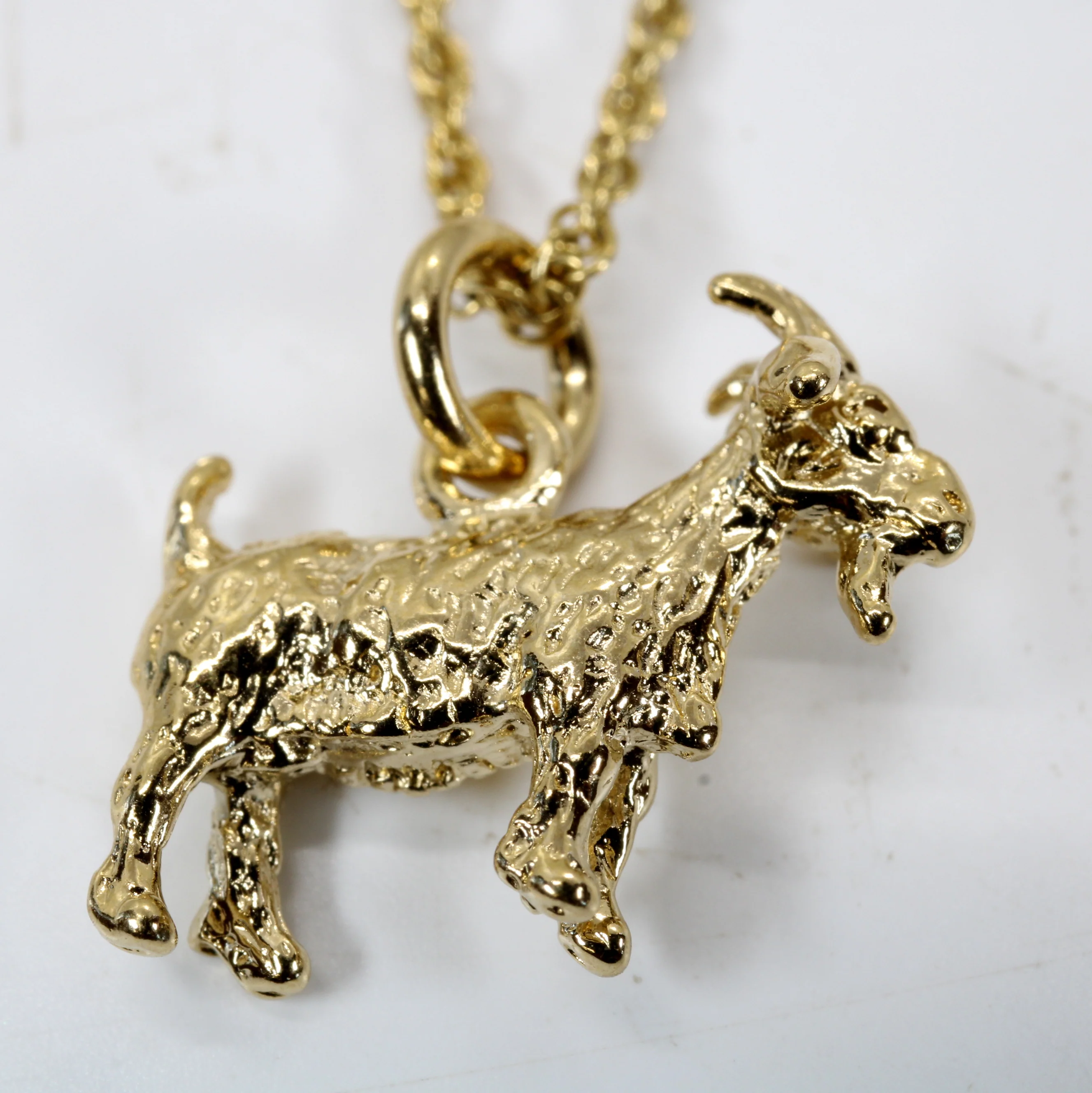 Small Gold Pygmy Goat Necklace with a 3-D 14kt Gold Vermeil Goat Questions & Answers