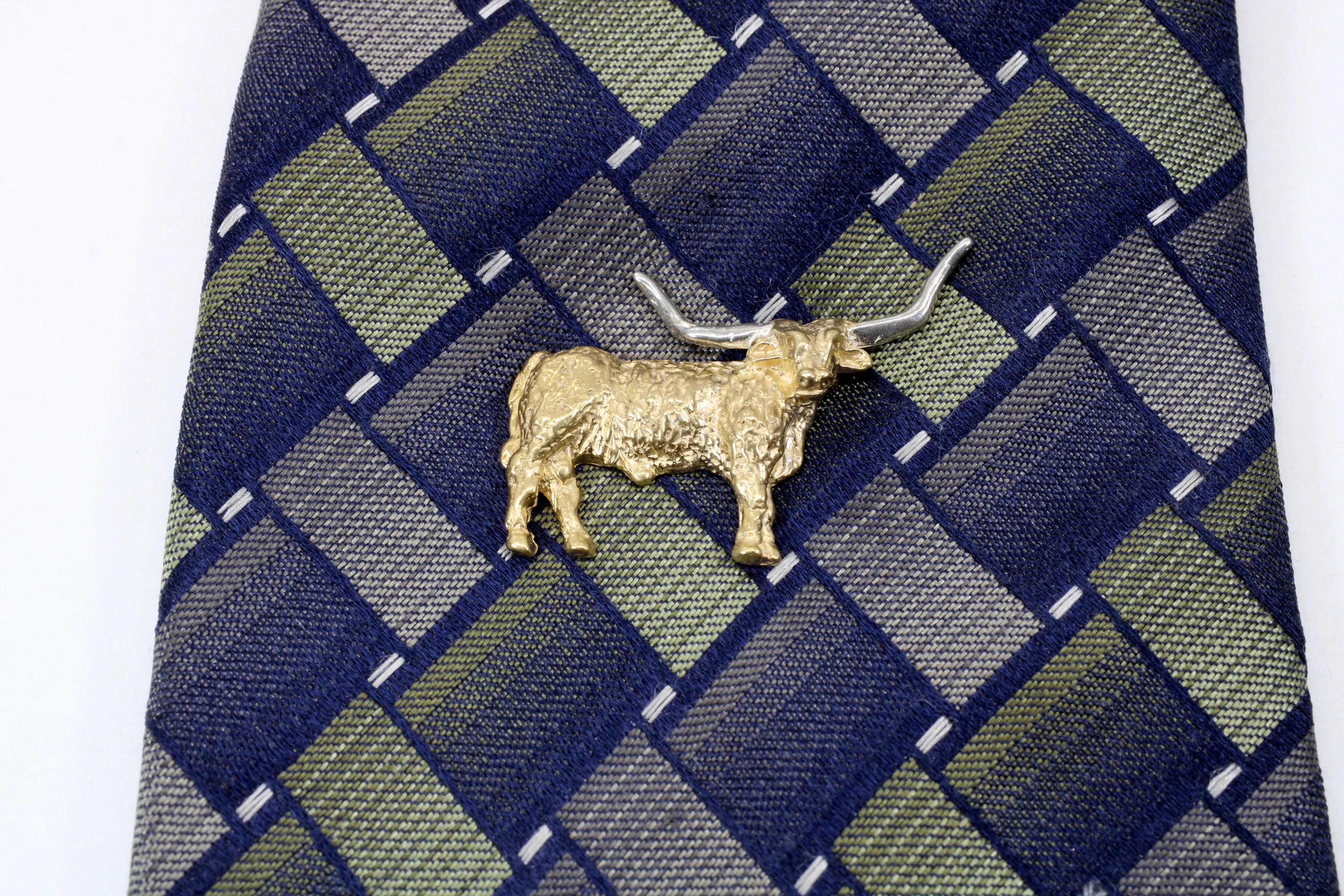 Is there a custom design service available for the Longhorn Tie Tack?