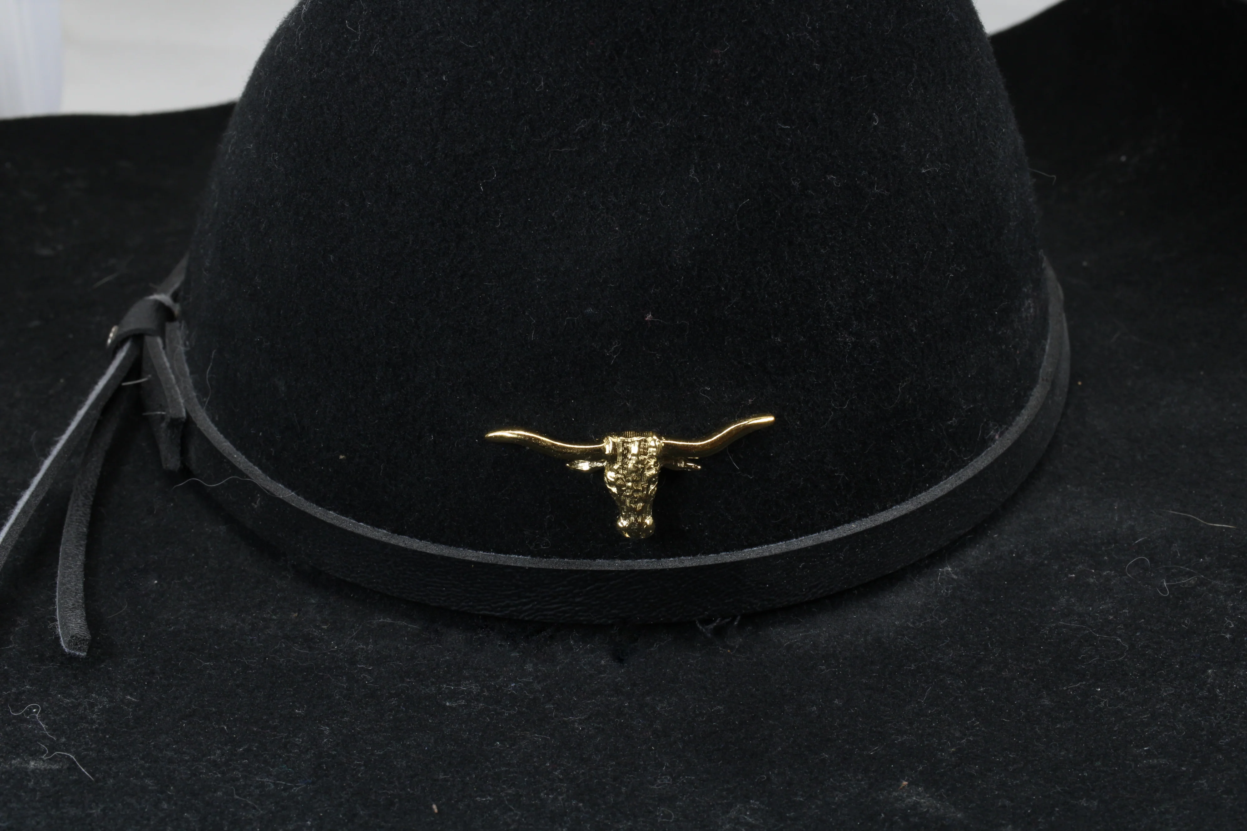 What is the material used for the Longhorn hat pin?