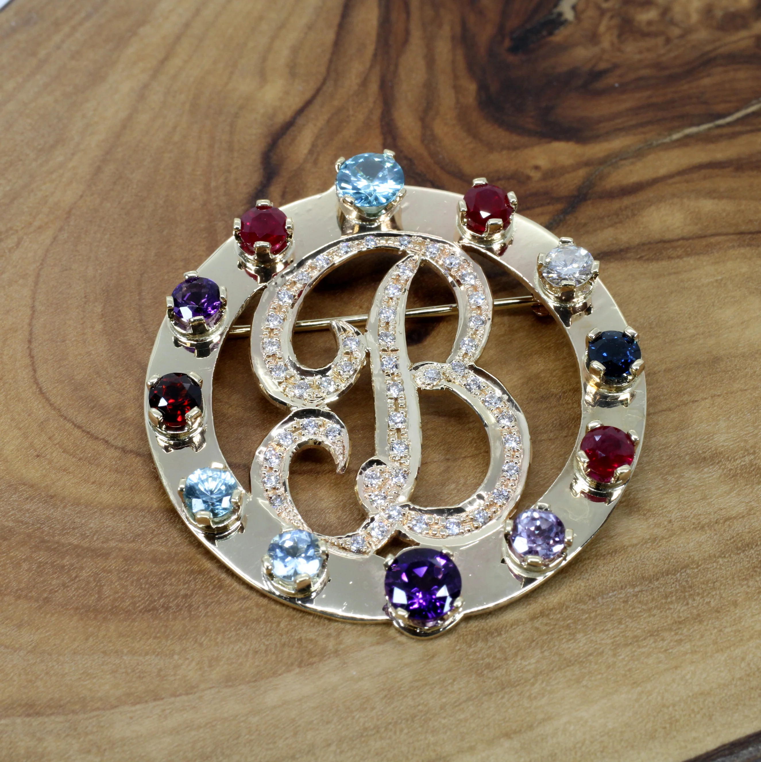 Mothers Birthstone Brooch in solid 14kt Gold With Natural Gemstones Questions & Answers