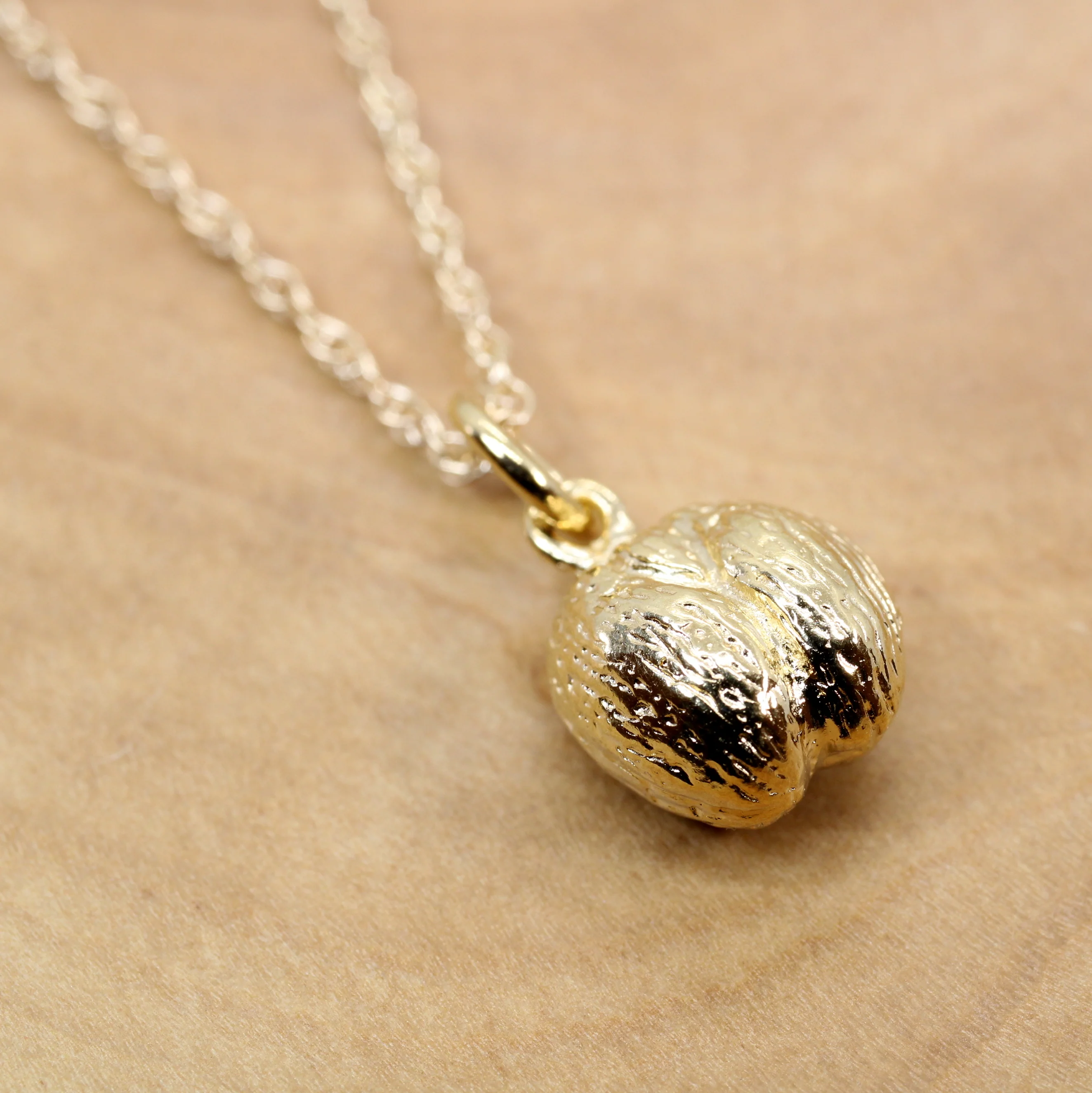 Gold Coco De mer Seed necklace, earrings, or charm in 14kt Vermeil Questions & Answers