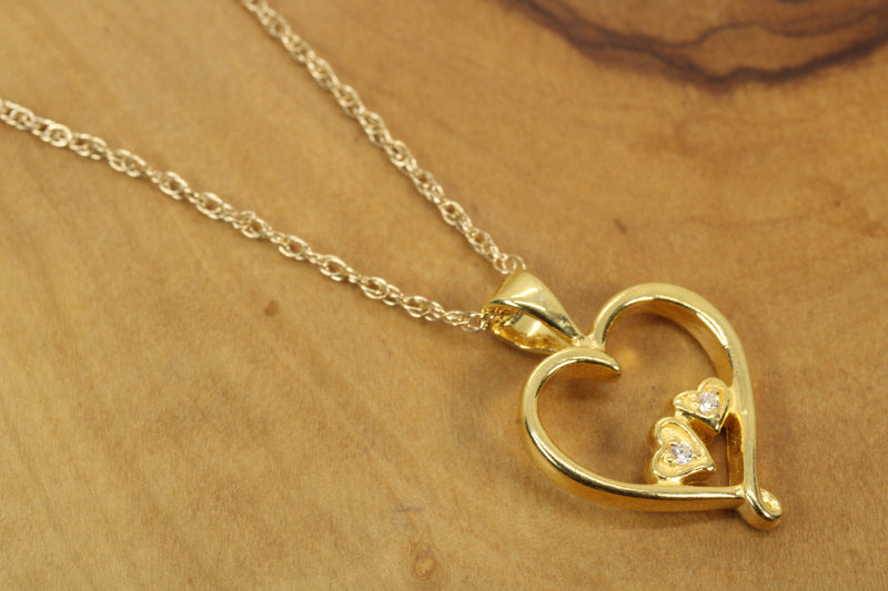 Gold Open Heart with two tiny hearts with a CZ stone in them Necklace