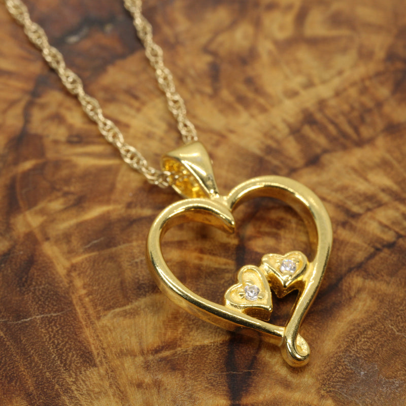 Gold Open Heart with two tiny hearts with a CZ stone in them Necklace