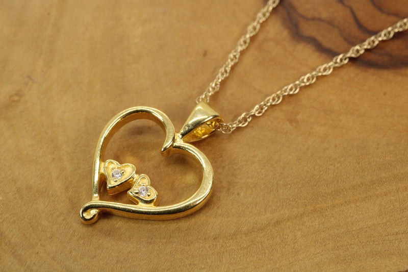 Gold Open Heart with two tiny hearts with a CZ stone in them Necklace