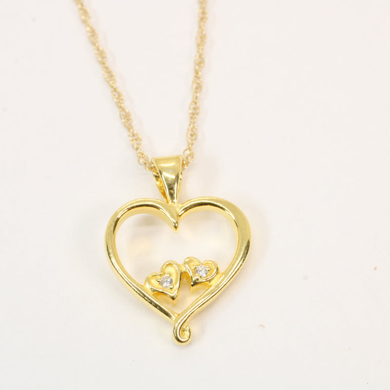 Gold Open Heart with two tiny hearts with a CZ stone in them Necklace
