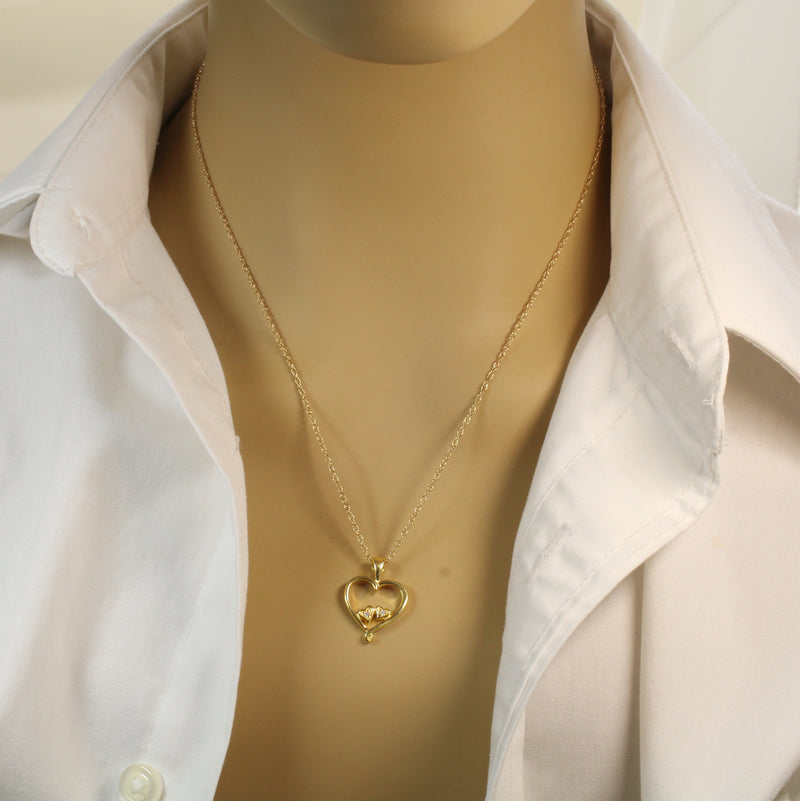 Gold Open Heart with two tiny hearts with a CZ stone in them Necklace