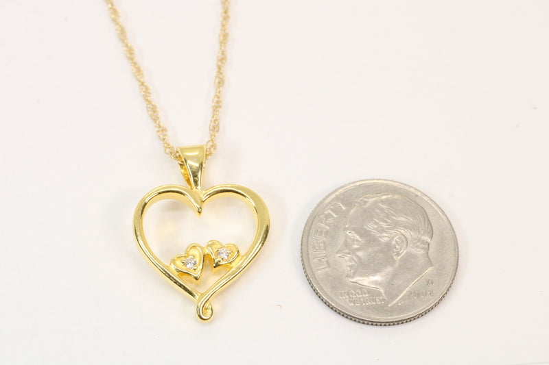 Gold Open Heart with two tiny hearts with a CZ stone in them Necklace