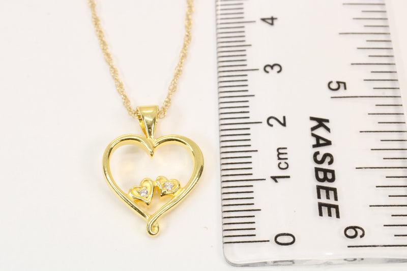 Gold Open Heart with two tiny hearts with a CZ stone in them Necklace