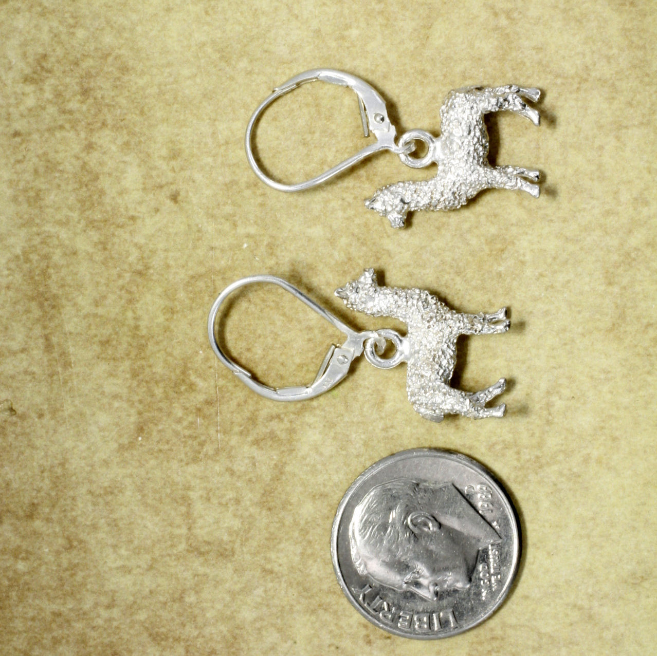 Orecchini in argento sterling 925 con lama di alpaca e dettagli Orecchini in argento sterling 925 con lama di alpaca e dettagli