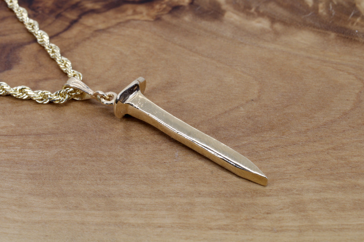 Our skinny classic railroad spike plated in 14k gold is a must