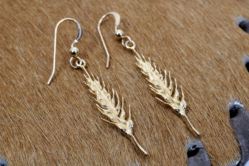 14kt Yellow Gold Wheat Earrings dangling on wires for wheat grower